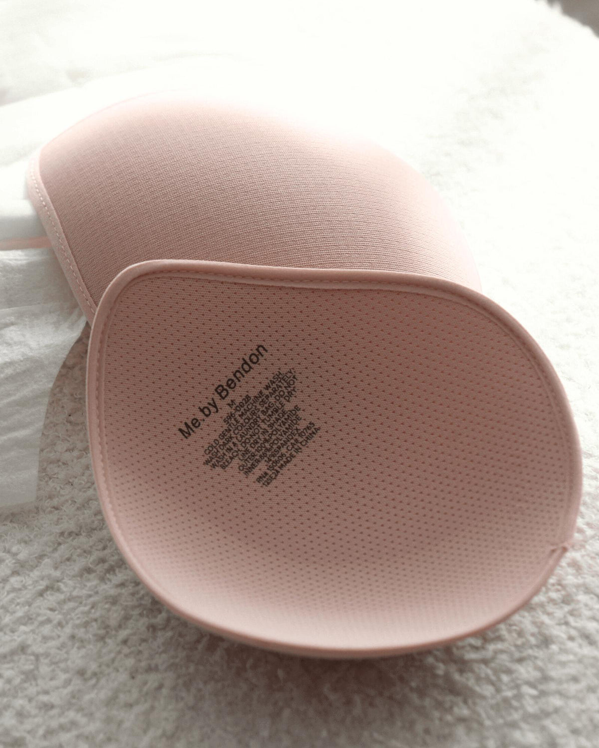 Reusable Nursing Pads in Nude. Flat lay back view