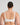 Model wears Coral Underwire Bra in WHITE. On body back view
