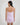 Model wears Sweet Indulgence Chemise in PALE LILAC. On body back view