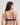 Model wears Leonie Underwire Bra in SURF THE WEB. On body back view