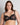 Model wears Daring Underwire Bra in BLACK. On body front view