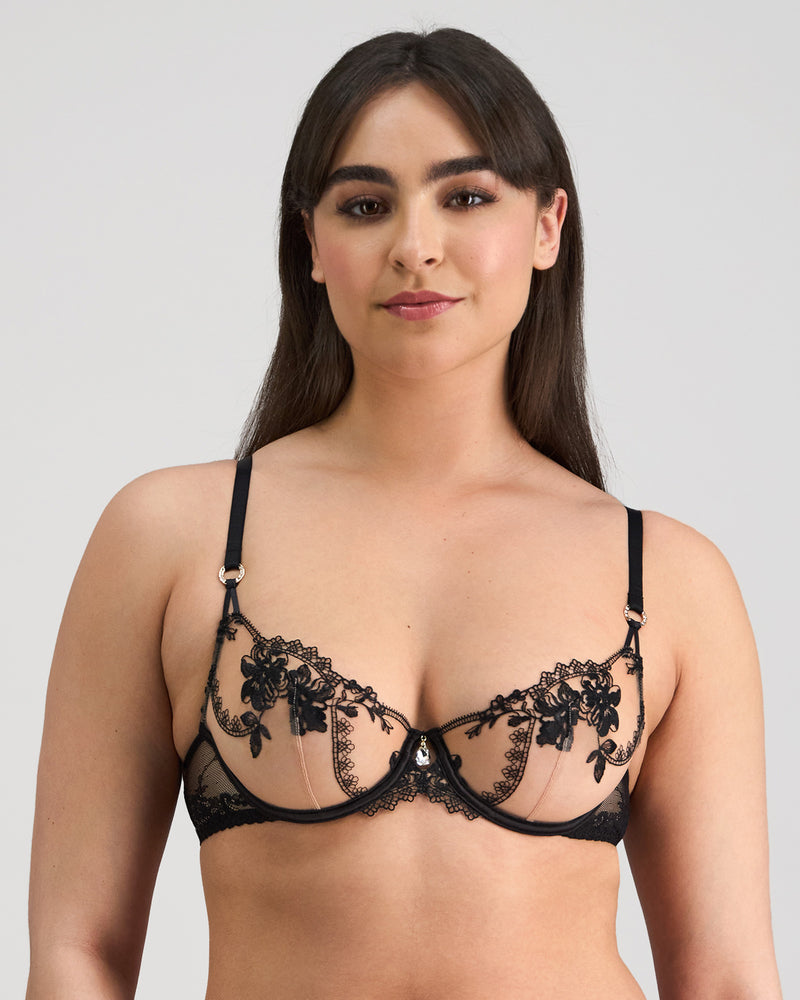 Model wears Niara Underwire Bra in BLACK. On body front view
