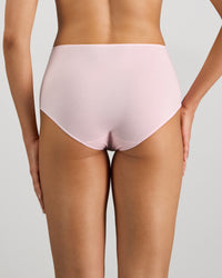 Model wears Au Naturel Full Brief in PALE LILAC. On body back view