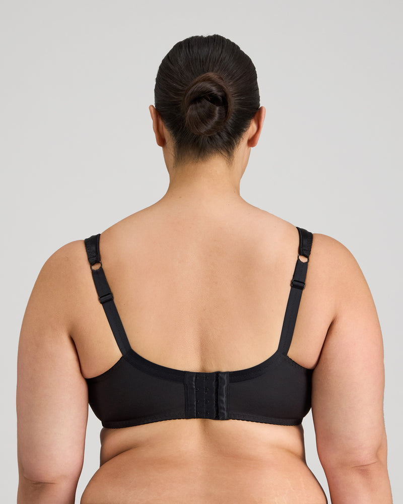 Model wears Charlotte Underwire Bra in BLACK. On body back view