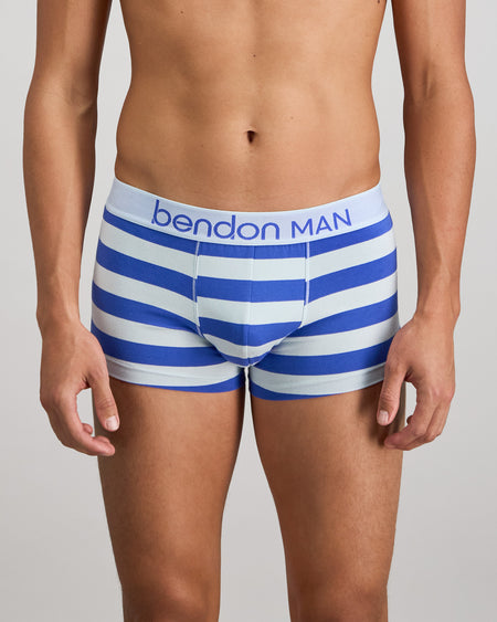 Model wears Rugby Stripe Mens Trunk in SKYWAY/DAZZLING BLUE. On body front view