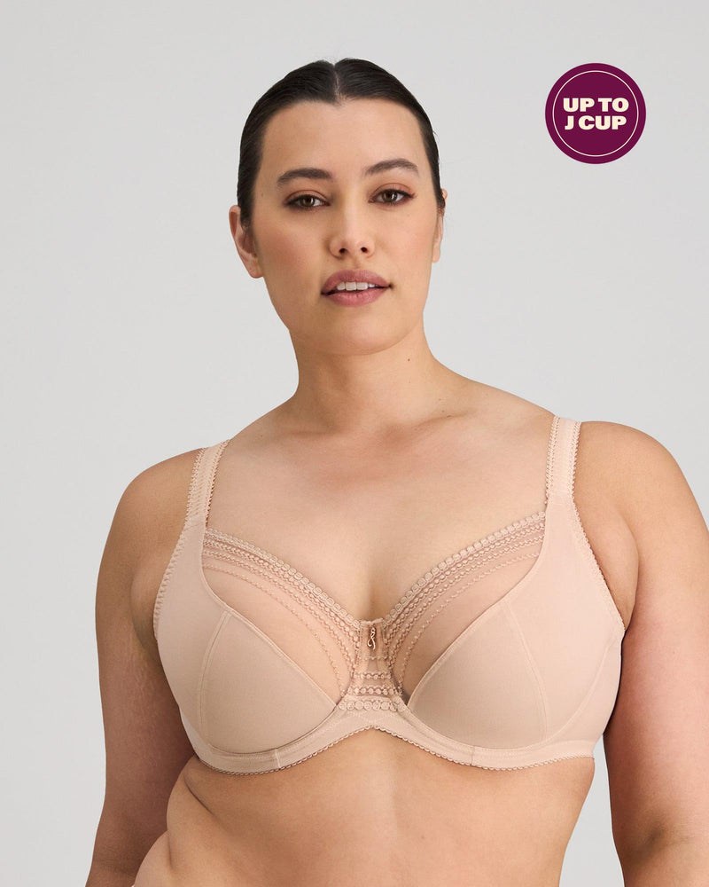 Model wears Faithful Underwire Bra in LATTE. On body front view