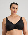 Model wears Charlotte Underwire Bra in BLACK. On body front view