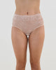 Model wears All Lacey Full Brief in LATTE. On body front view