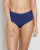 Model wears Seamless Soft Full Brief in Medieval Blue. On body front view