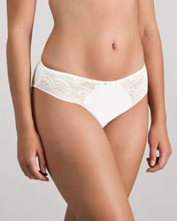 Model wears Renee Bikini in WHITE. On body side view