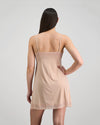 Model wears Understatement Slip in LATTE. On body back view
