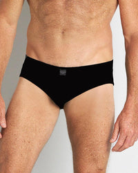 Model wears High Tech Cotton Mens Brief in BLACK. On body front view