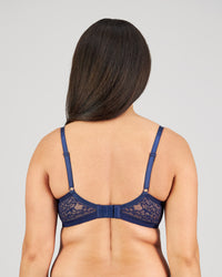 Model wears Eternal Underwire Bra in Medieval Blue. On body back view