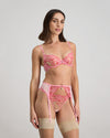 Model wears Josephine Suspender in SACHET PINK. On body side view