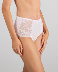 Model wears Embrace Full Brief in FESTIVAL BLOOM. On body side view