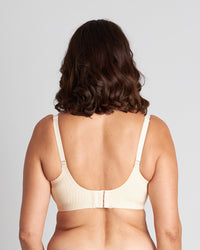 Model wears Comfit Collection Contour Bra in NOVELLE PEACH. On body back view