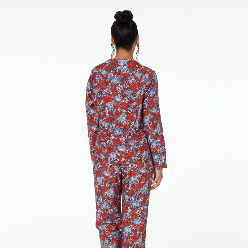Model wears Marguerite Long Sleeve PJ Top in SAPPHIRE FLORAL PRINT. On body back view