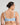 Model wears Charlotte Underwire Bra in SKYWAY. On body back view