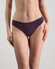 Model wears Au Naturel Thong in PLUM PERFECT. On body front view