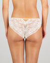 Model wears Dekota Devine Bikini in SUGAR. On body back view