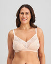 Model wears Bendon Nurture Maternity Bra in LATTE. On body front view