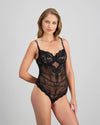 Model wears My Fit Lace Bodysuit in BLACK. On body side view