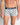 Model wears Retros Print Mens Trunk in ART DECO TILE PRINT. On body front view