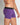 Model wears Everyday Essential Mens Trunk in PURPLE MAGIC. On body side view