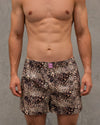 Model wears Sleigh The Night Boxer in WILD LYNX PRINT. On body front view