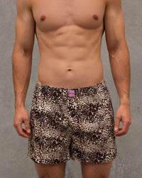 Model wears Sleigh The Night Boxer in WILD LYNX PRINT. On body front view