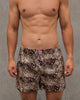Model wears Sleigh The Night Boxer in WILD LYNX PRINT. On body front view