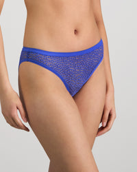 Model wears Effortless Everyday Bikini in DAZZLING BLUE. On body side view
