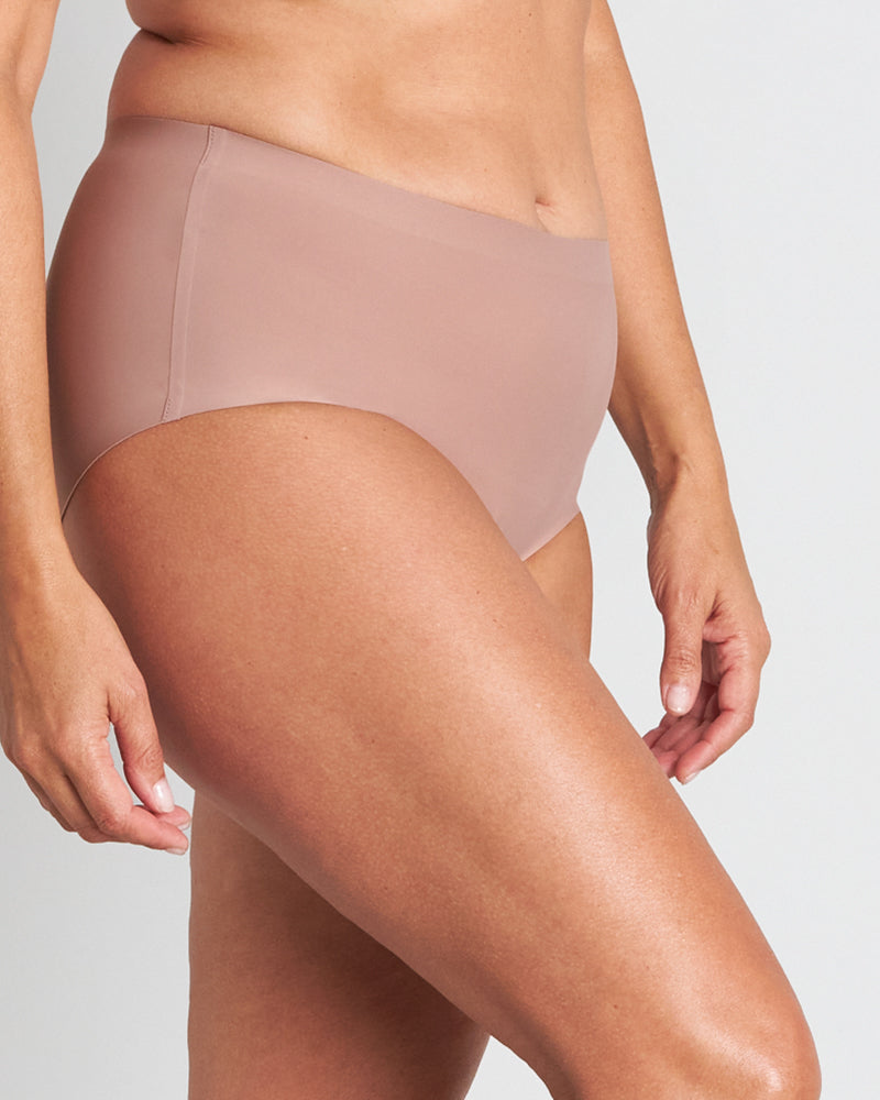 Model wears Flo Light Full Brief in MOCHA. On body side view