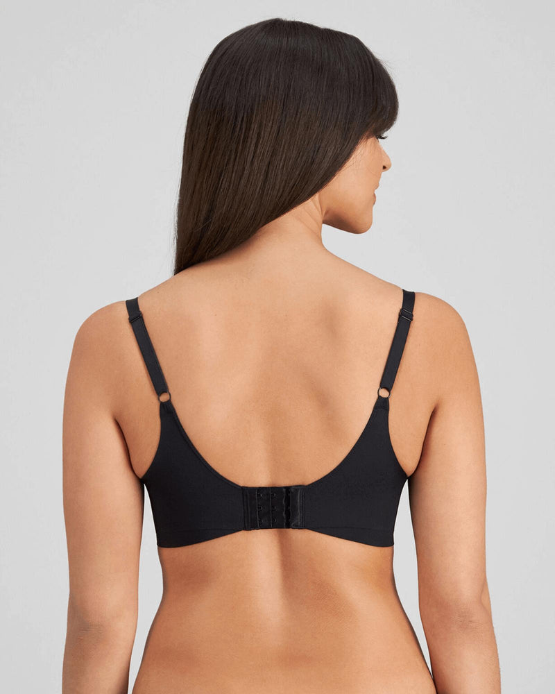 Model wears Flawless Form Contour Bra in BLACK. On body back view