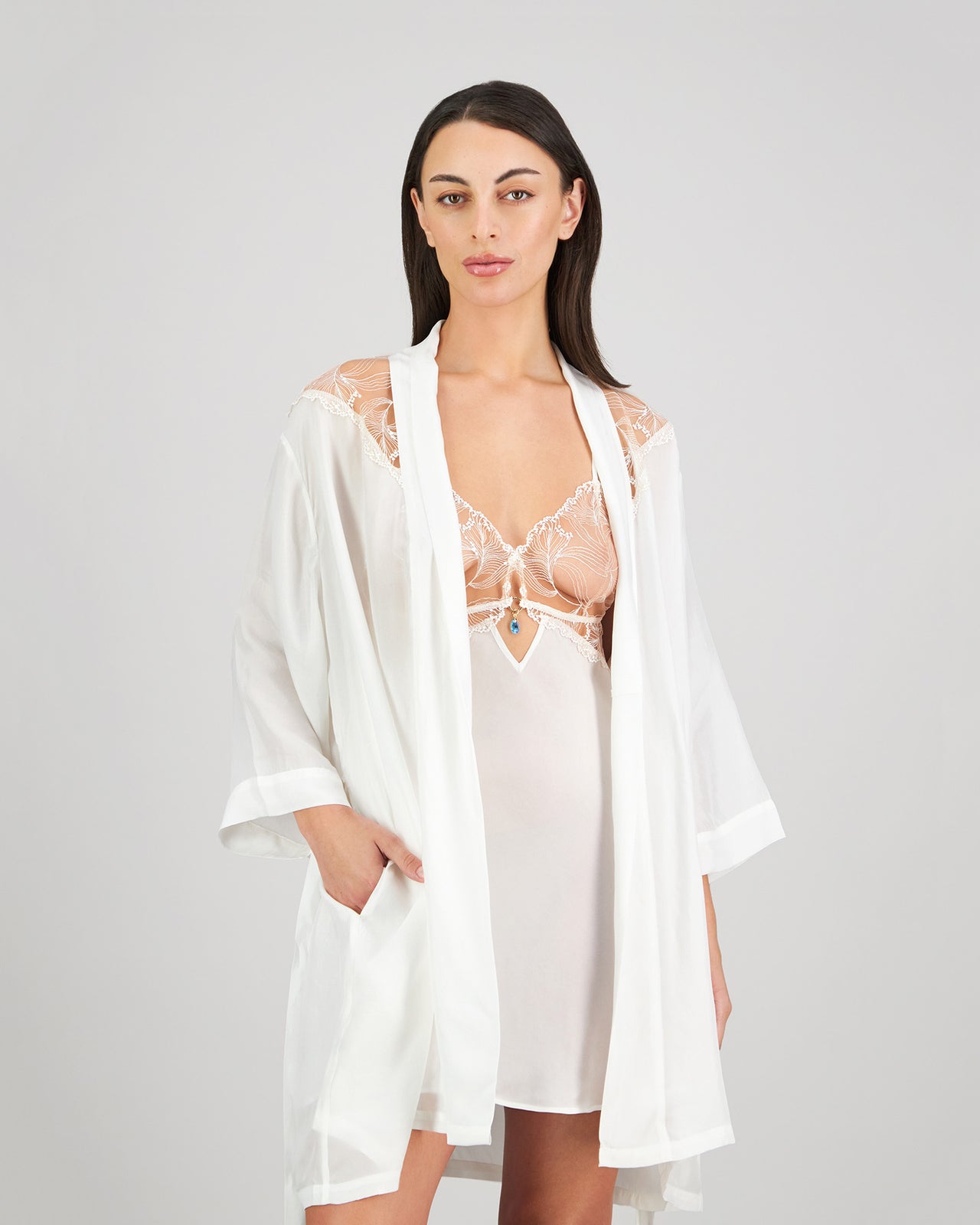 Model wears Eros Robe in SUGAR. On body front view