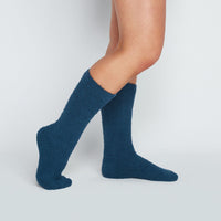 Model wears Cardrona Socks in INSIGNIA BLUE. On body front view