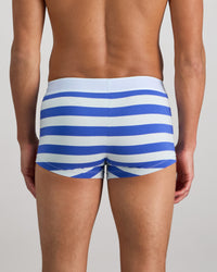 Model wears Rugby Stripe Mens Trunk in SKYWAY/DAZZLING BLUE. On body back view