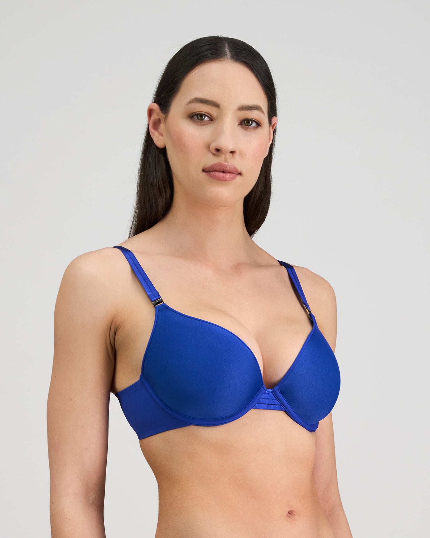 Model wears Plunge Perfect Contour Bra in DAZZLING BLUE. On body side view