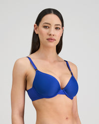 Model wears Plunge Perfect Contour Bra in DAZZLING BLUE. On body side view