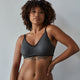 Model wears Elodie Maternity Bra in JET/PEWTER. On body front view