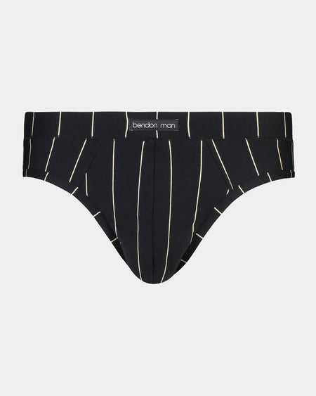 Model wears High Tech Cotton Mens Brief in BLACK STRIPE. On body front view