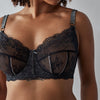 Model wears Sofia Underwire Bra in JET/PEWTER. On body side view