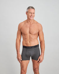 Model wears Cotton Classics Mens Trunk in GREY MARL. On body front view