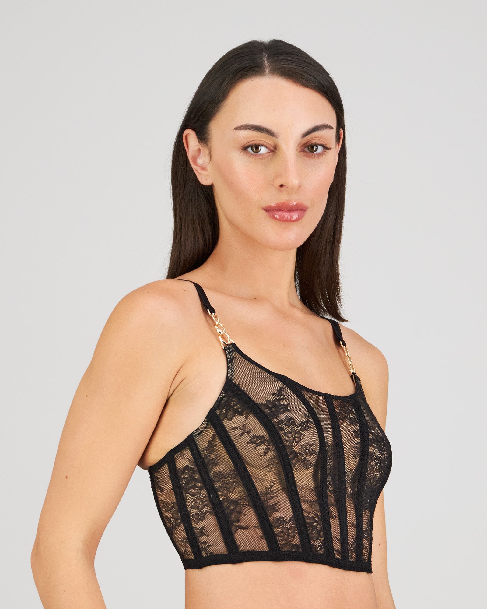 Model wears Scarlet Lover Corset in BLACK. On body side view