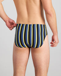 Model wears Cotton Stretch Mens Brief in YELLOW/REGATTA STRIPE. On body back view