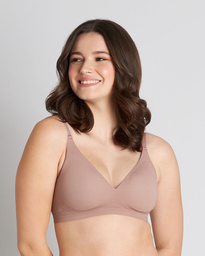 Model wears Comfit Collection Wire Free Bra in MOCHA. On body front view