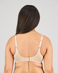 Model wears Manifest Underwire Bra in LATTE. On body back view