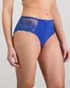 Model wears Intrigue Midi in DAZZLING BLUE. On body side view
