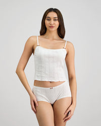 Model wears Body Cocoon Boyshort in WHITE. On body front view