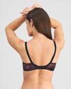Model wears Confessions Contour Bra in SNAKE PRINT/BLACK. On body back view